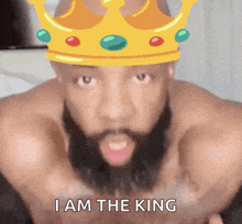 a shirtless man with a crown on his head and the words i am the king below him