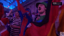 darts fans spiderman costume cheering cheer