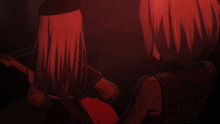 a girl with long red hair is playing a guitar in a dark room