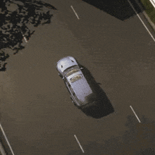 two cars are parked on the side of the road