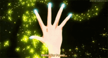 a woman 's hand is shown with the words venus star power written below it .