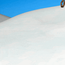 a cartoon character in a santa suit is on a sled