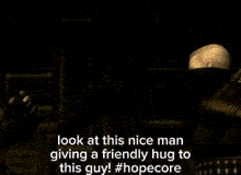 a man is giving a friendly hug to another man in a dark room