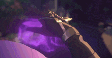 a close up of a person 's head with purple hair .