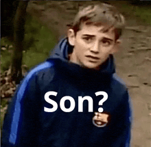 a young man in a blue jacket with the word son on it