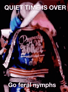 a person wearing a jacket that says " quiet time is over "