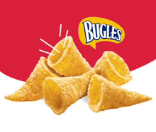 a pile of bugles corn cones on a red and white background