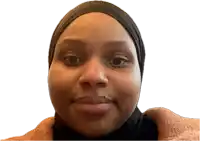 a close up of a woman 's face wearing a black head scarf
