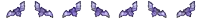 a set of purple flames on a white surface