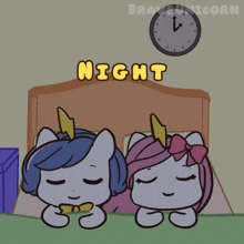 two unicorns are sleeping in a bed with the word night above them