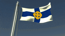 a blue and white flag with a yellow circle on it