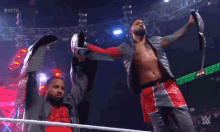 The Usos Undisputed Tag Champs GIF - The Usos Undisputed Tag Champs GIFs