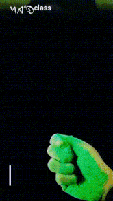 a hand in a green glove is holding a green powder that says was on it