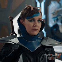a woman is wearing a power rangers costume