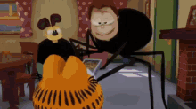garfield and a spider are standing next to each other