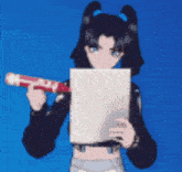 a girl is holding a piece of paper and a marker with the letter r on it