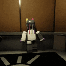 a robot is standing in front of a wall with a sun on it