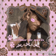 a picture of arthur de aeris with a pink kiss on his cheek