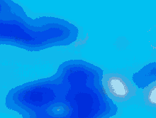 a blurred blue background with a few white dots