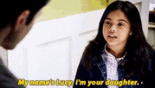 a young girl is talking to a man and says my name 's lucy , i 'm your daughter .