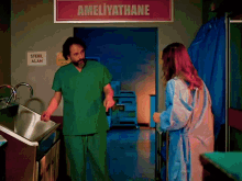 a man in a green scrub is talking to a woman in a blue gown in front of a sign that says ameliyathane