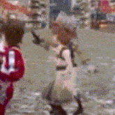 a blurred image of a person with a number 1 on their jersey