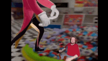 a cartoon character is standing next to a man in a red shirt in a room with a bunch of toys .