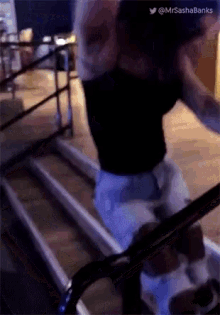 a person is standing on a set of stairs with a watermark that says mrsasha banks
