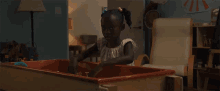 Child Staring GIF - Child Staring Play Box GIFs