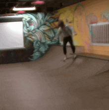 a person is riding a skateboard down a ramp