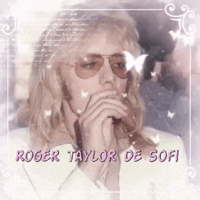 roger taylor de sofi is wearing sunglasses and smoking a cigar
