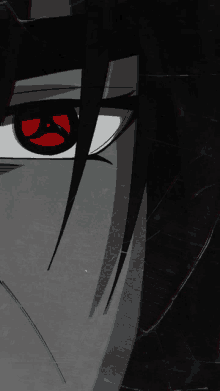 a close up of a person 's face with red eyes