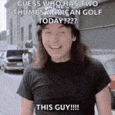 a man wearing a black shirt and a hat is smiling and says guess who has two thumbs and can golf today