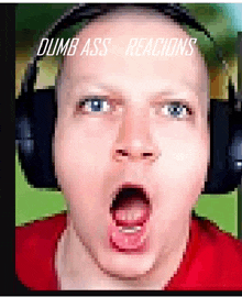 a pixelated image of a man wearing headphones with the words dumb ass reactions above his head