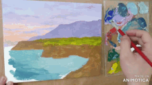a person is painting a landscape with the words made in animotica below