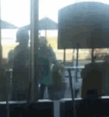 a blurry picture of people sitting in a restaurant