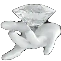 a statue of a hand holding a diamond with a white background