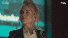 an advertisement for nine perfect strangers with a woman in a suit