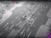 an aerial view of a destroyed city street with the words wav on the bottom right