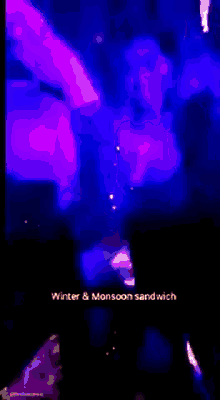 a group of people are dancing in a dark room with the words winter & monsoon sandwich on the bottom