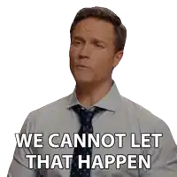 a man in a blue shirt and tie says " we cannot let that happen "