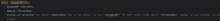 a blurred image of a black background with a few words in orange