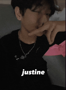 a person with justine written on the bottom