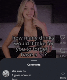 a woman in a black top is asking how many drinks would it take for you to forget i have a