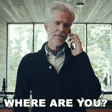 a man talking on a cell phone with the words " where are you " above him
