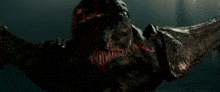 a monster with blood coming out of its mouth