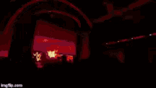 a pixelated image of a crowd of people at a concert with a yellow sign that says ' usa ' on it