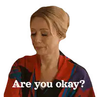a woman wearing a red and black robe is asking if she is okay