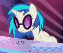 a cartoon pony wearing sunglasses and a unicorn horn