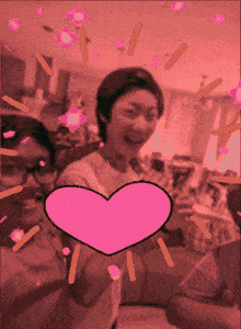 a picture of a man and a woman with a pink heart surrounding them